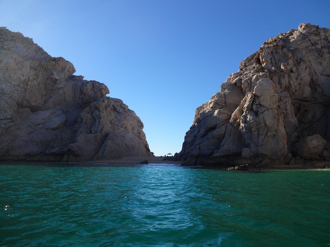 Playa del Amor (Lover's Beach), a secluded sand cove beside El Arco at Land's End, Cabo San Lucas.